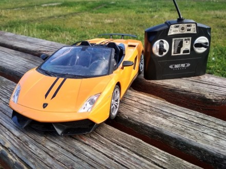 Машинка на радио управлении Lamborghini, с аккумулятором на зарядке. В отличном . . фото 4