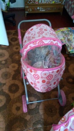 Продам коляску для игрушек в нормальном состоянии, розовая, сделана под настоящу. . фото 5