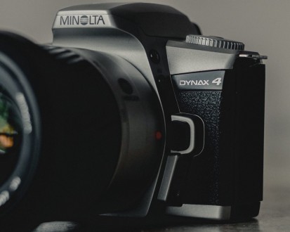 Компактный зеркальный 35 мм пленочный фотоаппарат.
Объектив Minolta 28-100 mm f. . фото 4