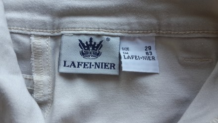 Продам брюки женские ,,LAFEI-NIER,, , светло-бежевые,в отличном состоянии, практ. . фото 3