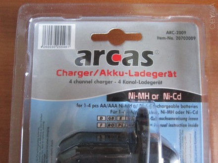 Используется для зарядки Ni-MH / Ni-Cd аккумуляторных батарей типа AA / AAA. Ори. . фото 4