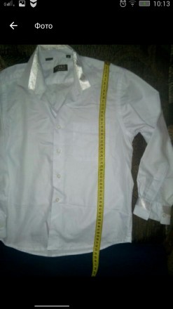 Красивая белая рубашка в хорошем состоянии с атласными вставками на манжетах рук. . фото 3