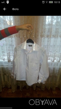 Красивая белая рубашка в хорошем состоянии с атласными вставками на манжетах рук. . фото 1