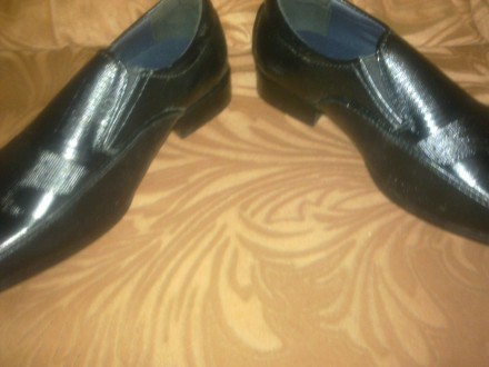 Продам новые качественные туфли на мальчишку 30 размера, черного цвета, на прочн. . фото 7