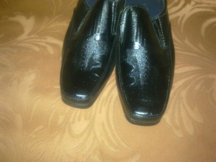 Продам новые качественные туфли на мальчишку 30 размера, черного цвета, на прочн. . фото 6