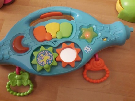 Іграшка може бути розвиваючої дугою, коли дитина лежить, і ходунками з музичною . . фото 5