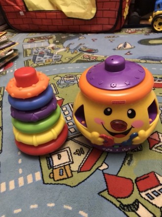 Моя первая развивающая игрушка Playgro Пирамидка из пяти разноцветных колец, кот. . фото 2