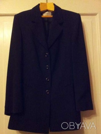 Женский пиджак черного цвета.
Наш размер 46,
Европейские размеры указаны на фо. . фото 1