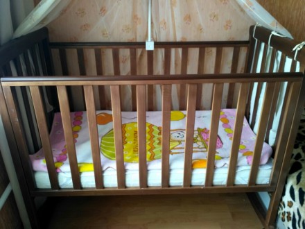 Продам нашу кроватку фирмы Соня Верес 
Кроватка в хорошем состоянии 
Цвет-ольх. . фото 3