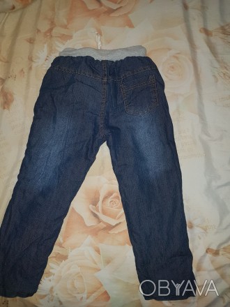 Продам зимние джинсы унисекс с утеплителем внутри в хорошем состоянии на возраст. . фото 1