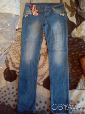Красивие женские джинси.Размер 29-30.Джинси новие,не подошли по размеру.. . фото 1